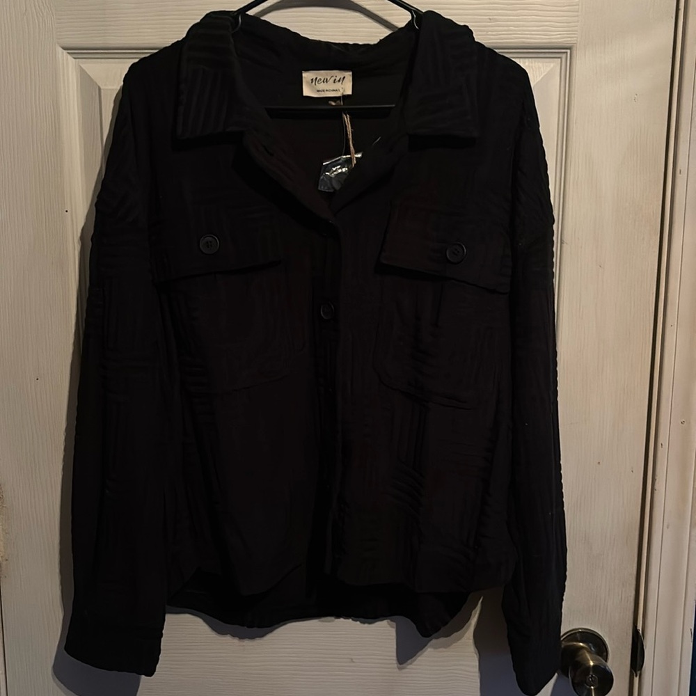 Black long sleeve button up patterned top